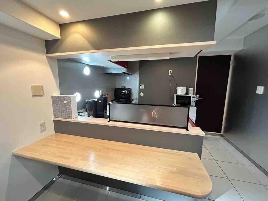 Appartement メルシアター鈍色の風・最上階デザイナーズルーム à Ōsaka Extérieur photo