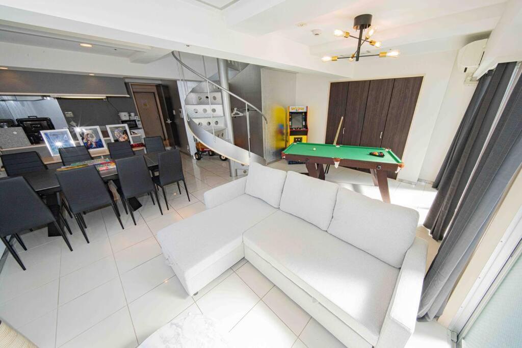 Appartement メルシアター鈍色の風・最上階デザイナーズルーム à Ōsaka Extérieur photo