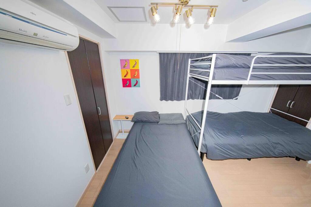 Appartement メルシアター鈍色の風・最上階デザイナーズルーム à Ōsaka Extérieur photo