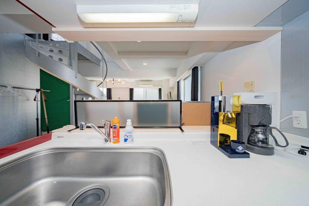 Appartement メルシアター鈍色の風・最上階デザイナーズルーム à Ōsaka Extérieur photo