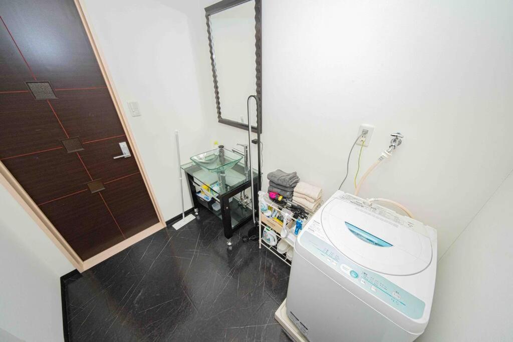 Appartement メルシアター鈍色の風・最上階デザイナーズルーム à Ōsaka Extérieur photo