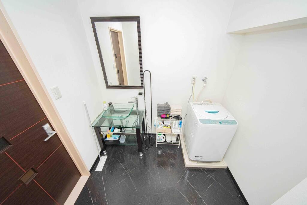 Appartement メルシアター鈍色の風・最上階デザイナーズルーム à Ōsaka Extérieur photo