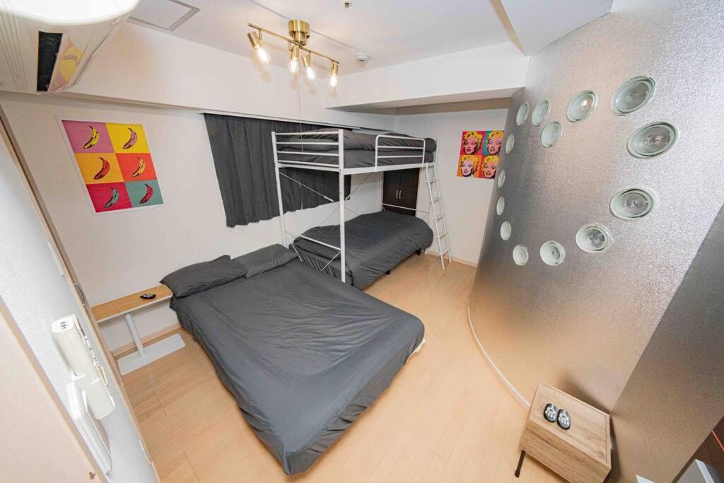 Appartement メルシアター鈍色の風・最上階デザイナーズルーム à Ōsaka Extérieur photo