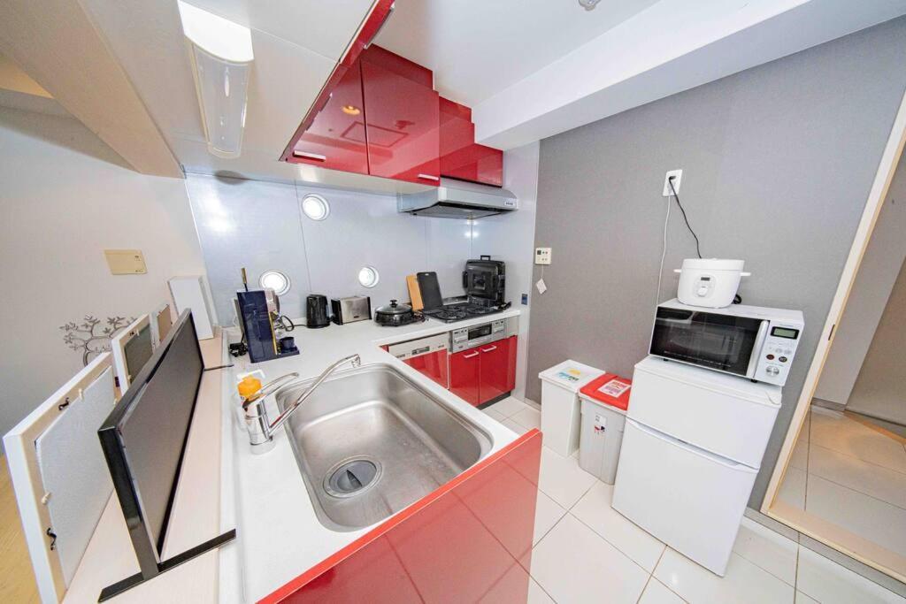 Appartement メルシアター鈍色の風・最上階デザイナーズルーム à Ōsaka Extérieur photo